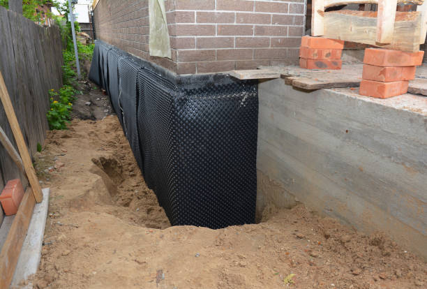 SJ Waterproofing Pros technician performing targeted Foundation Crack Repair assessment in North Rose, NY